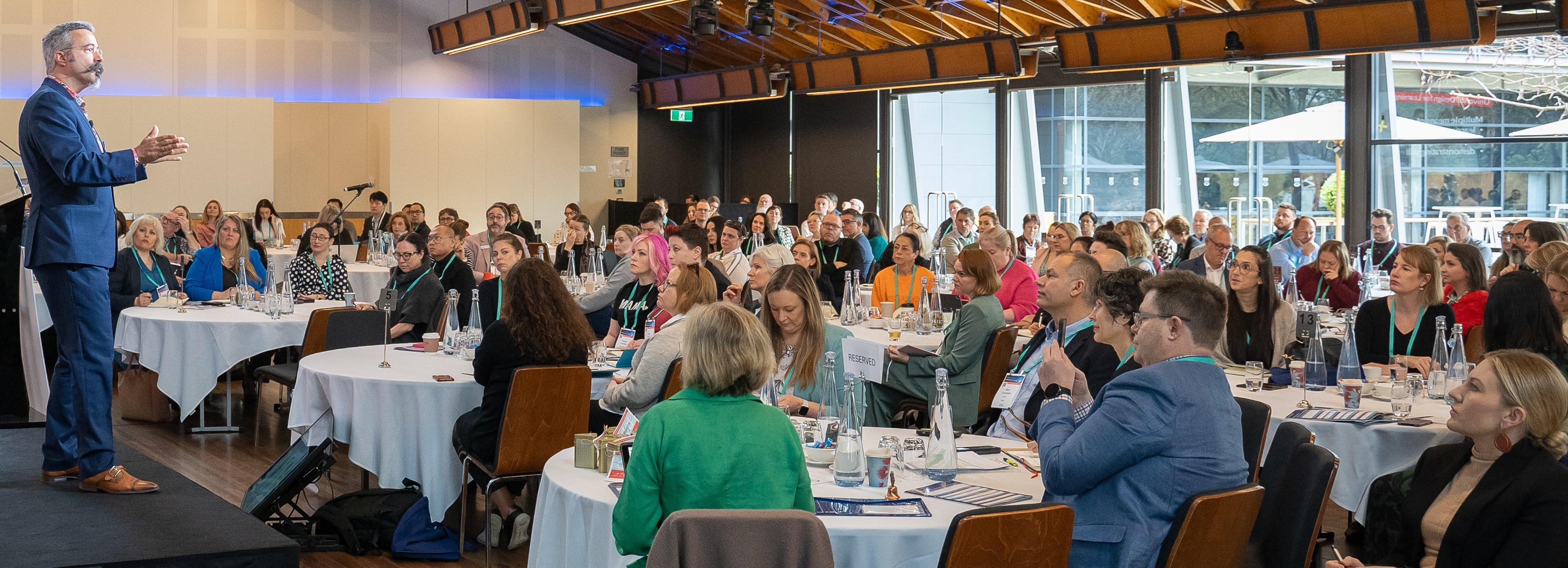 Wide-angel image showing an audience of 500 people as Tom giving the plenary address to the Australian Institute for Training and Development in Adelaide, Australia in 2024